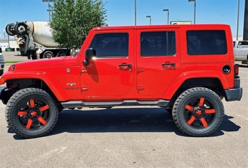 Photo of red Jeep upgraded by Commercial Tire