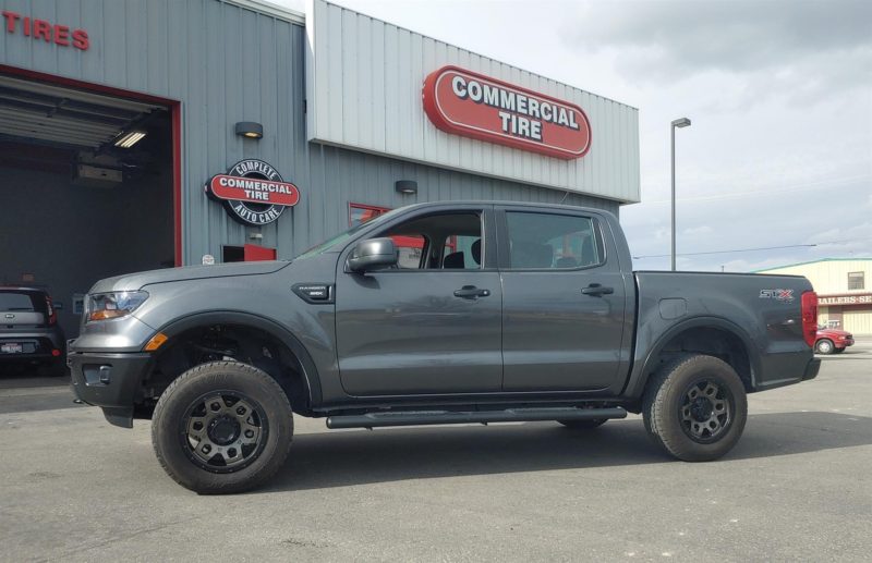 Photo of dark grey truck upgraded by Commercial Tire
