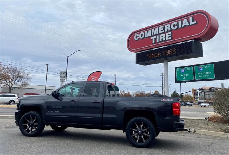 Photo of a Chevrolet Silverado in front of a Commercial Tire location