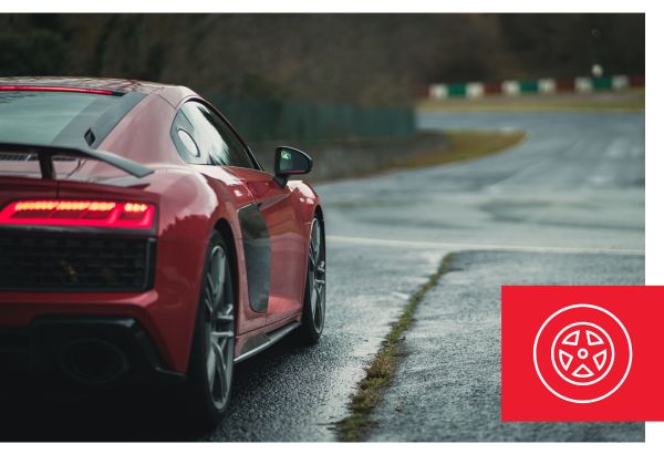 sports car driving on road